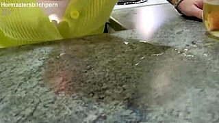 Kiwi milf sub slurps wine after master's messy spill.