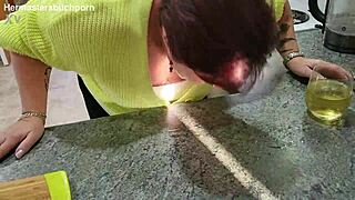 Kiwi milf sub slurps wine after master's messy spill.