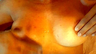 Stepmom massages her big tits with cum from monster cock