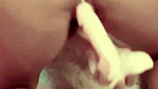 Tanned girl adjusts bikini and requests milk during massage.