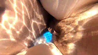 Pregnant milf enjoys pool time with neighbors watching