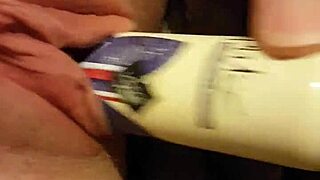 Young Slut Stretches Her Shaved Pussy With Deodorant Can During Massage