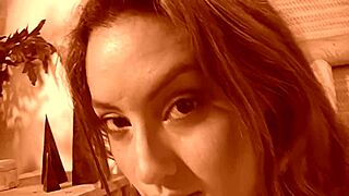 Jassie masturbates with handjob and licking on bed.