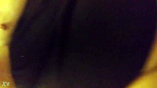 Sexy milf with big boobs masturbates in bed.