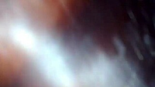 This brunette girlfriend sucks big cock in homemade interracial scene.