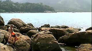 A Mature Man Fucks An Exotic Babe Wearing Only A Cap And Sunglasses On The Seaside Stones