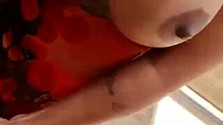 brazilian milf with tattoos seduces for a delicious handjob, feeling the big cock on her big tits