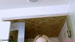 blonde girl takes shower