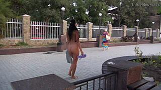 this milf is strolling nude in public, flashing passersby like a naughty exhibitionist