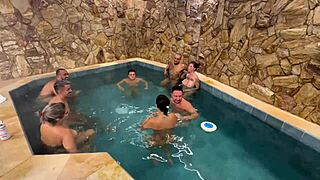 hey check out this fun orgy with friends splashing around in the motel pool