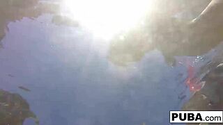 Olivia dives into nude solo fun in the pool with big tits.