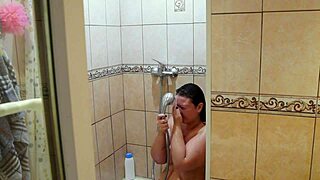 Home Cam Captures Chubby Milf Showering And Shaving