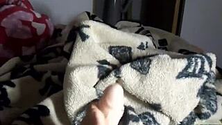 In a dominant scene, the milf gives an intense footjob while teasing her pussy.