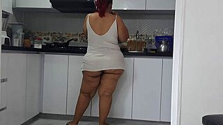 i watch my stepmother's large backside in the kitchen