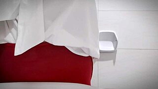 The sexy horny office girl masturbates in the bathroom, revealing her big tits and tight pussy close up