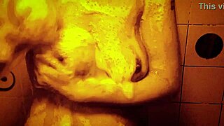 Wow, check out this sexy slow mo shower with horny milf massaging her wet tits and nipples!