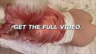 straight-jacket babe with pink hair shows off her natural tits