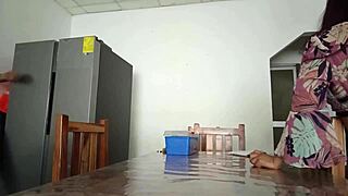 Maintenance Man Checks Refrigerator While Housewife Shows Vagina On Table