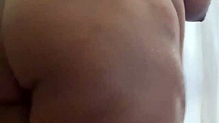 Squirting ebony BBW washes big ass with toys in sexy fat milf session