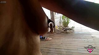 Nippleringlover nude on bicycle with handcuffs extreme stretched pierced nipples and pierced pussy lips