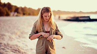 Olive Gee and her blonde girlfriend share intimate moments on the bed with kissing and muff diving.