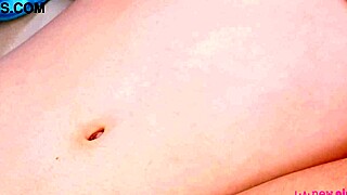 Charming blonde poses naked in close-up view.