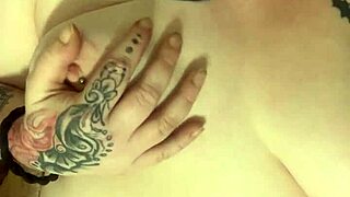 Oh man, check out this beautiful chubby redhead getting into some solo masterbation action with her natural tits and wet pussy