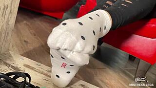 Why don't you watch goddess tease with feet in socks and barefoot under desk?