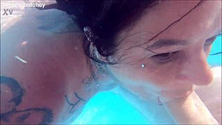 holiday threesome in the pool with big tits blonde and brunette milfs fingering wet pussies uh i mean licking