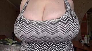 big gorgeous tits of chubby bbw milf swing in close-up view during her solo session