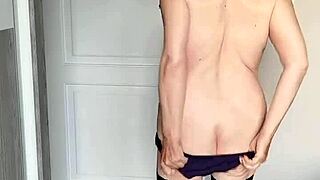 busty mature milf in stockings shows closeup