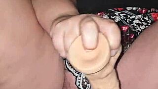 Milf squirts intensely with a huge dildo thrusting deep inside her wet pussy. She moans loudly during the solo toy session.