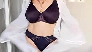 busty mature milf in stockings shows closeup