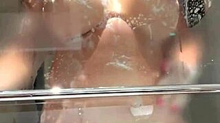 Busty Shower Fantasy with Lenushka Doll Submerged in Bubbles Suggesting Wet Curves