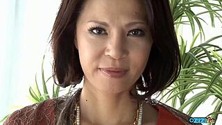 Hey, does this Japanese granny still get wet seeing your erection? asks the interviewer during casting with fingering and vibrator play.