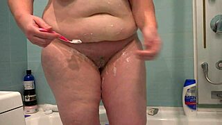 Why not watch this chubby blonde milf shaving her luscious trimmed pussy and big wet cunt up close?
