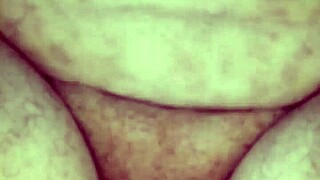 My hot wife poses elegantly in casual attire.