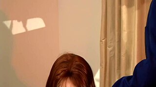 The red milf lay on the bed, bending over in fishnets as he started deepthroating and fingering her shaved pussy