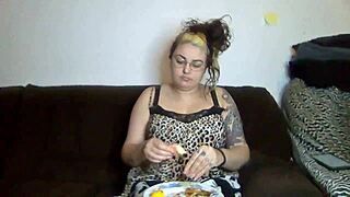 Rebeca Addams with big tits eats shrimp in behind the scenes footage.
