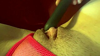 Italian milf Artemisia Love teases wet pussy with toy in slow motion.