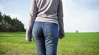 Watch this phat-ass milf tease in tight jeans outdoors