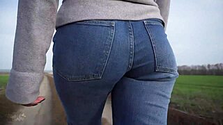 Watch this phat-ass milf tease in tight jeans outdoors