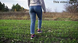 Watch this phat-ass milf tease in tight jeans outdoors