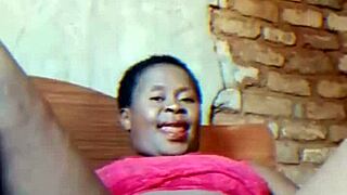 Hubby gone—watch this sexy African milf finger her dripping wet pussy teasingly!