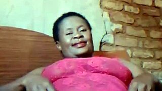 Hubby gone—watch this sexy African milf finger her dripping wet pussy teasingly!