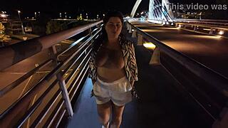 oh man luscious milf struts braless pantyless on bridge flashing huge tits