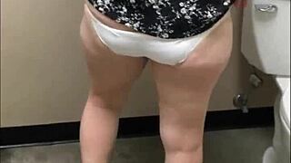 god, this pretty horny babe's peeing while flashing her perfect ass in bathroom