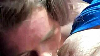 topless hooker rubs cum on face after deepthroat load in mouth