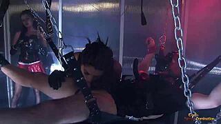 Busty Brunette Slut Punishes Chained Dude Hard With Partner Chick