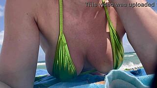 italian milf artemisia love's micro bikini barely hides those huge tits on miami beach
